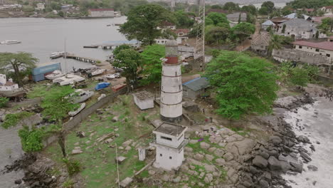 slow motion aerial pull out from aberdeen lighthouse in freetown, sierra leone