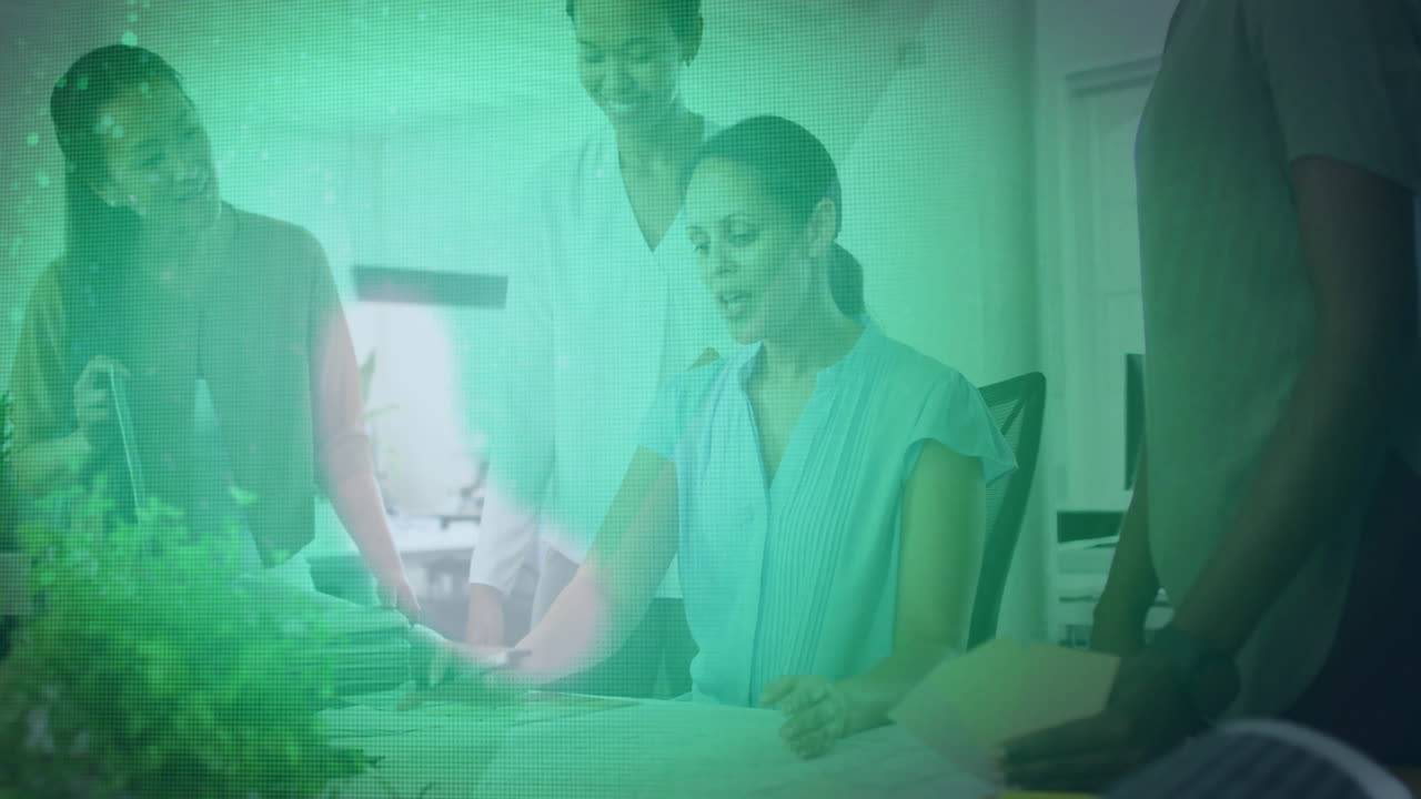 Collaborating over green digital data processing, business team in office meeting