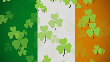 digital animation of multiple clover leaves floating against irish flag