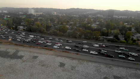 aerial of busy traffic filled highways of the 101 and 405 in the san fernando valley of los angeles