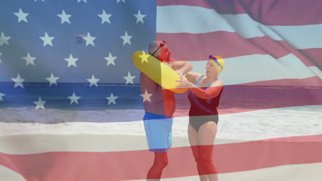 animation of flag of usa over caucasian senior couple on beach in summer