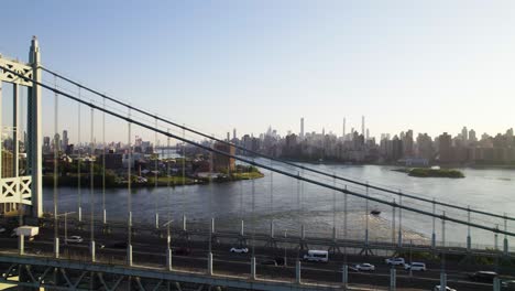 new york's triboro bridge, with traffic between manhattan and queens