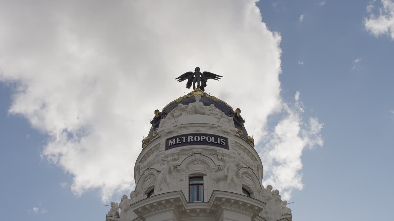 SLOW MOTION SHOT OF A BUILDING AT LA GRAN VIA IN MADRID SPAIN