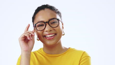 happy, face and woman with glasses in studio