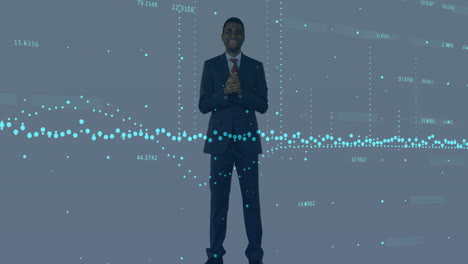 statistical data processing over african american businessman standing against grey background