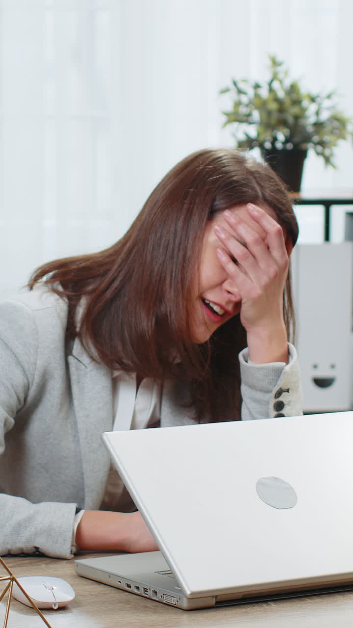 Businesswoman programmer software developer loses system error virus bad news data loss at office