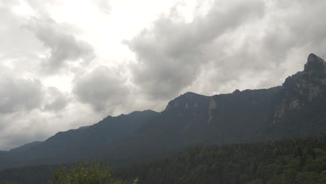 rainy clouds through the mountain timelapse