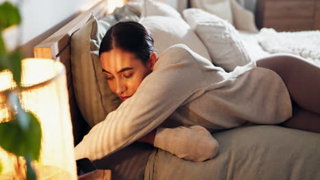 woman relaxing in bed at night