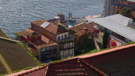 riverfront buildings at cais da ribeira on douro river in porto, portugal. high angle shot
