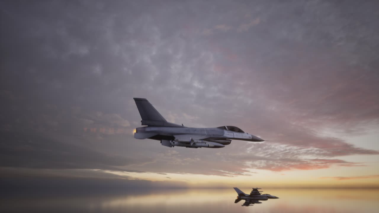 Et par jagerfly flyr lavt over vannet ved solnedgang
