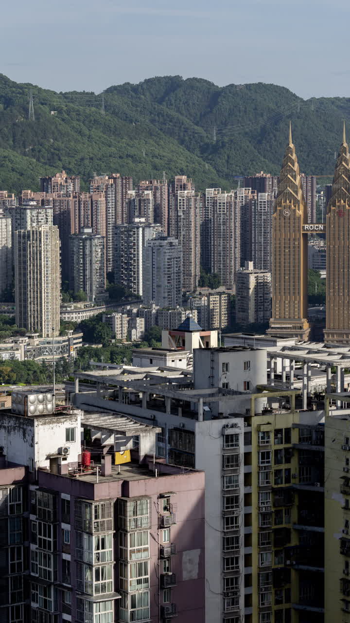 CHONGQING, CHINA - 18 MAY 2025 : Timelapse of the amazing Chongqing city skyline from a high vantage point in vertical