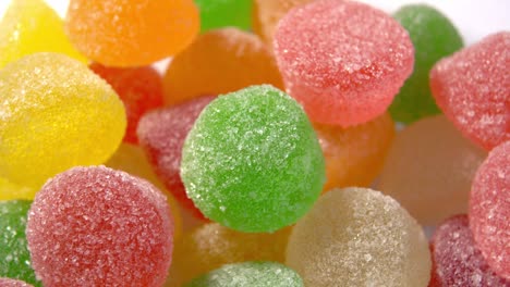 assorted sugary marmalade candies close-up. translucent candied jelly round shape. macro