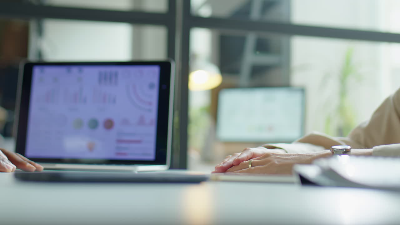 Business People Shaking Hands during Office Meeting