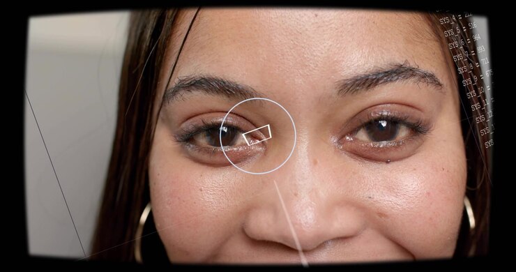 Woman holding steady, HUD appearing, overlay scanning left eye and locking reticle for security
