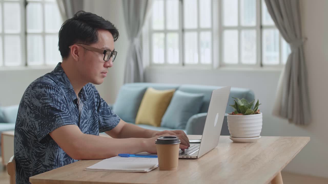 Man Work From Home With Laptop Computer, Video In 4K