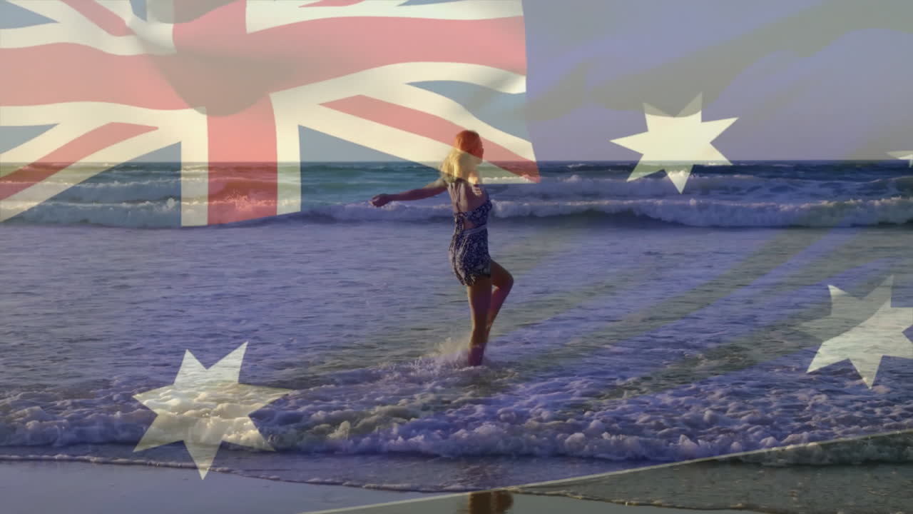 Walking on beach, person with Australian flag animation overlay in scene