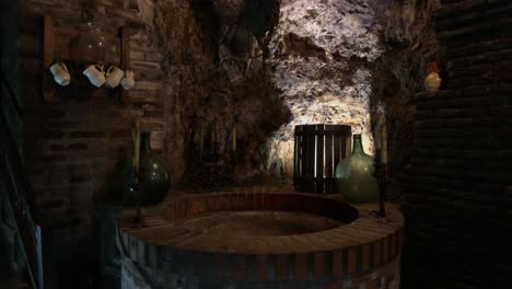 Woman-looking-at-an-underground-water-well