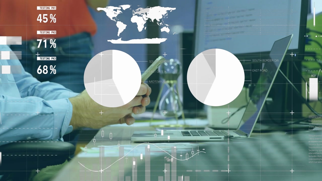 The person in the image is using a mobile phone at their desk in an office