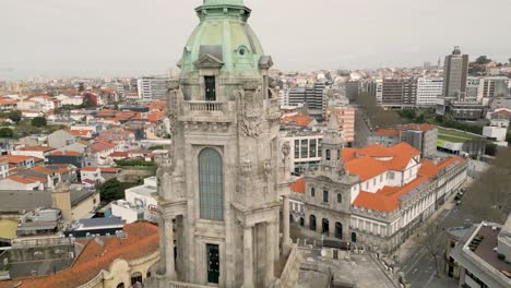 porto city hall clock and bell tower with city views in portugal