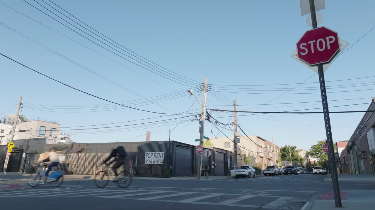City Street Scene with Cars and Stop Sign