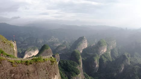 Aerial:-amazing-mountain-hike-in-Chinese-karst-Bajiaozhai-shan-mountain,-4K-view