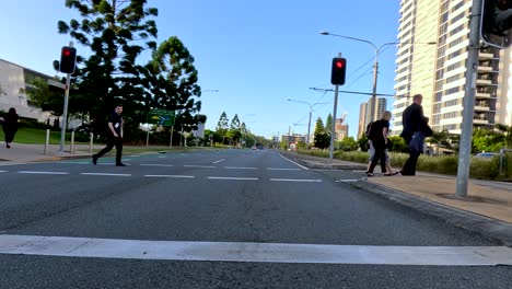 people crossing road in urban gold coast setting