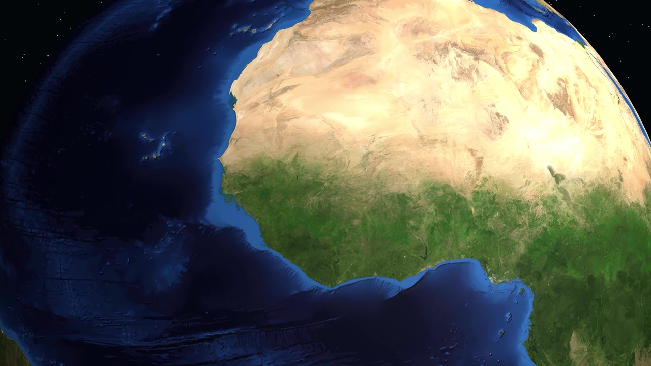 Un globo digitale ruota e zooma sull'Africa occidentale, individuando Bamako, Mali con coordinate precise.