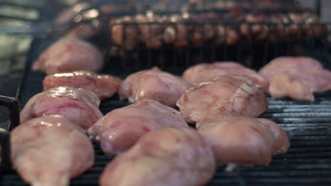 close up turkey breast roasting for picnic outdoor. grilling chicken meat.