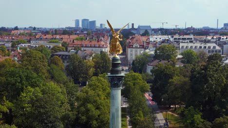 Gorgeous-aerial-top-view-flight-Gold-Angel-of-Peace-column-City-town-Munich-Germany-Bavarian,-summer-sunny-cloudy-sky-day-23