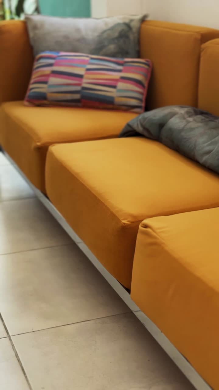 Modern Yellow Sofa with Cushions and Chrome Details