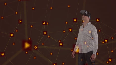 Network of connection icons against man using VR headset