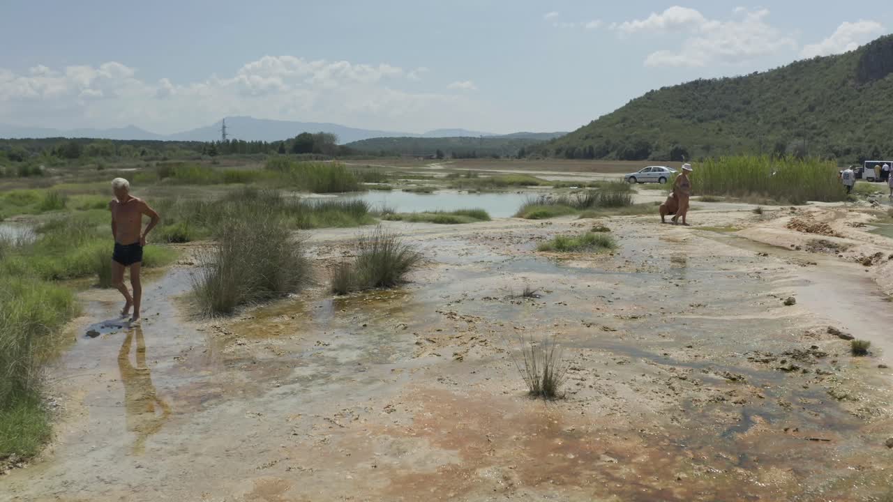 Zipline drone shot of the thermal mineral spring waters of St. Petka that many believe to be a source of healing for people who are sick, located in Rupite, Petrich, Bulgaria.