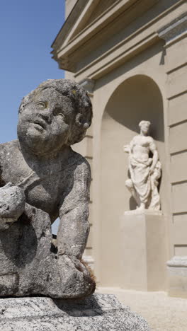 stone statues in a historical garden setting