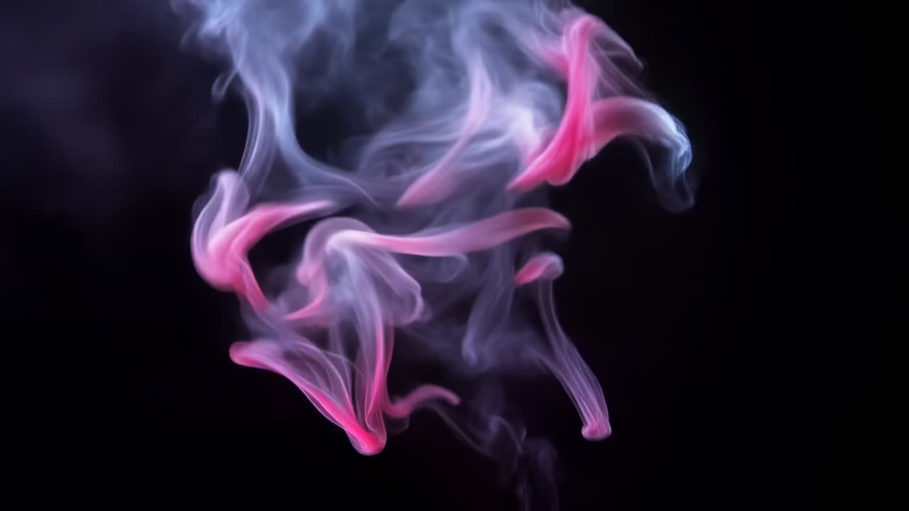 Uwalnianie różowych i lawendowych smug dymu tworzących stylizowany napis LOVE na ciemnym tle