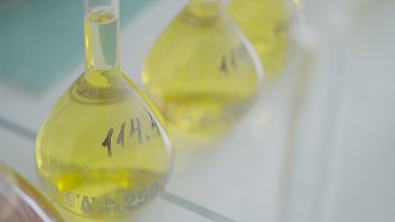 Laboratory Flasks with Yellow Liquid