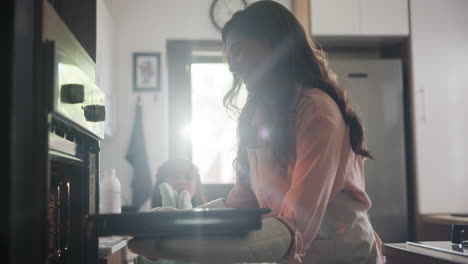 mother and daughter baking together