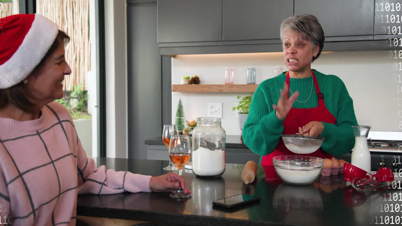 Home cook standing at island sifting flour following tablet recipe, binary code overlaying scene