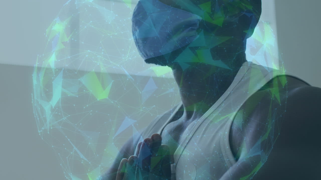 Globe of network of connections against african american man wearing face mask practicing yoga
