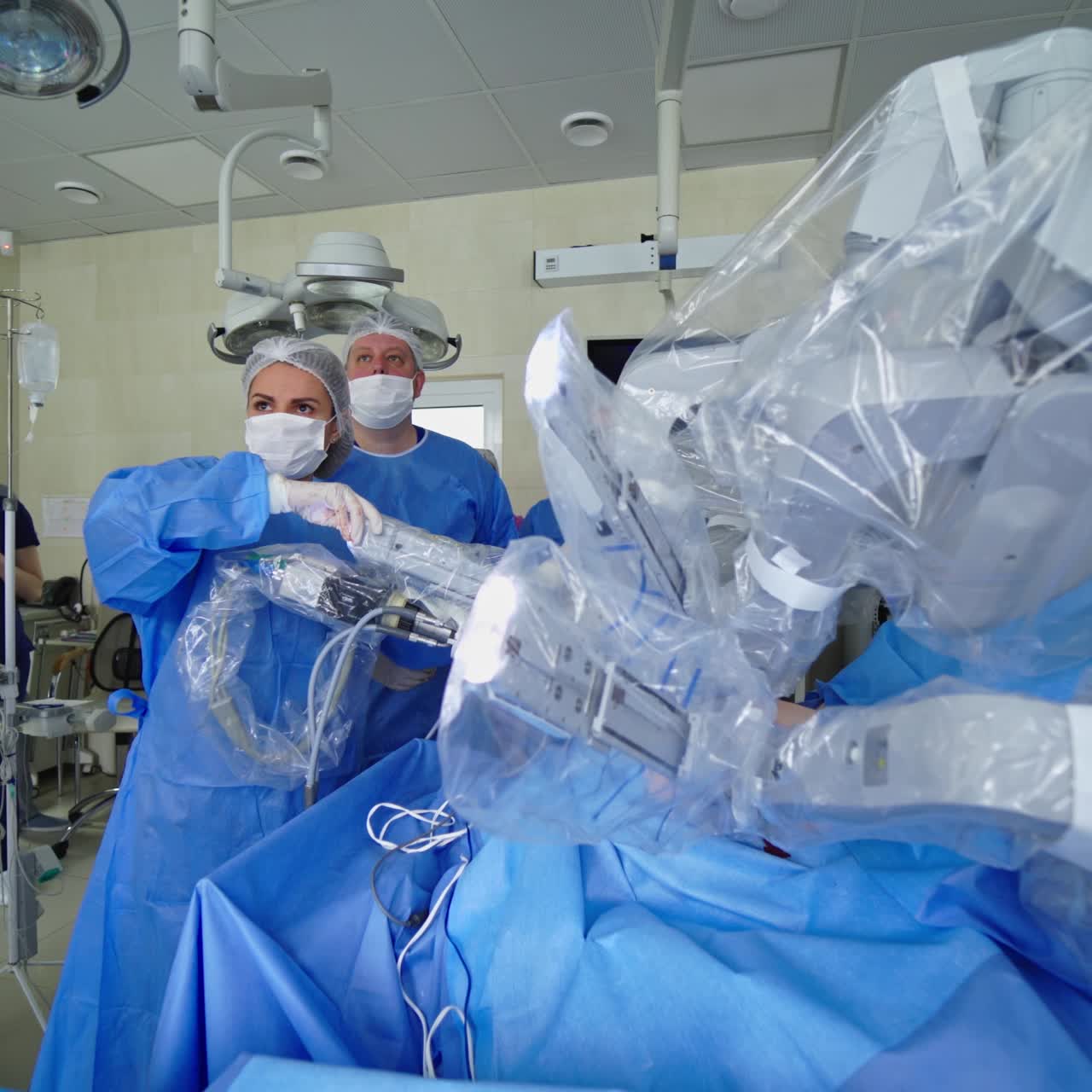 Modern surgical system. Operation with medical robot in the surgical room. Minimally invasive robotic surgery