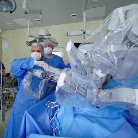 modern surgical system. operation with medical robot in the surgical room. minimally invasive robotic surgery