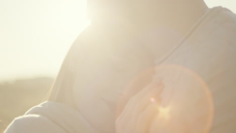 couple hugging at sunset for valentines day