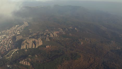 Drone-strafing-above-the-natural-rock-formations-of-Belogradchik-Fortress-in-the-province-of-Vidin,-in-Bulgaria