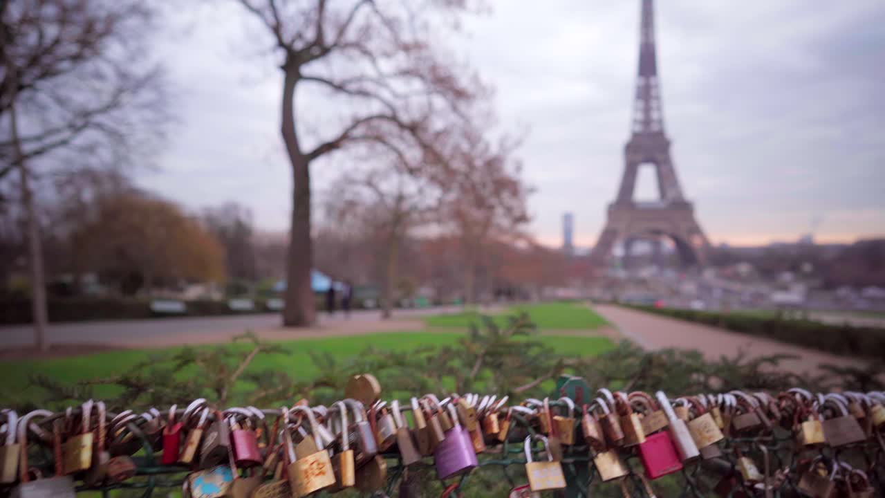 Love padlocks in Paris with view of the Eiffel Tower, romantic symbols in Paris, tourism in France