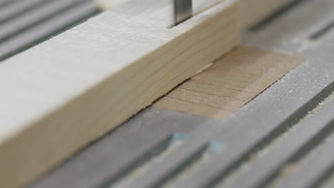 close-up of woodworking: precision cutting with a saw