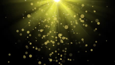 animación de manchas amarillas y manchas de luz brillante contra un fondo negro con espacio de copia