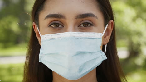 woman wearing face mask outdoors