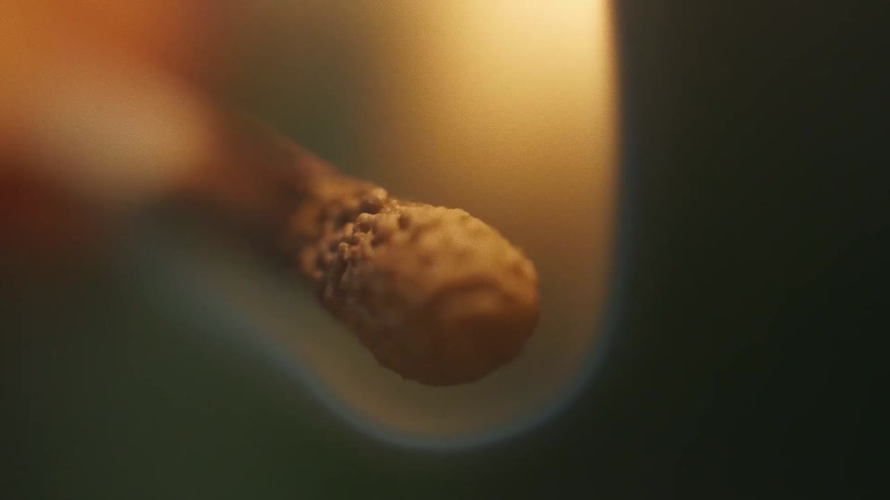Lighting a match in slow motion.