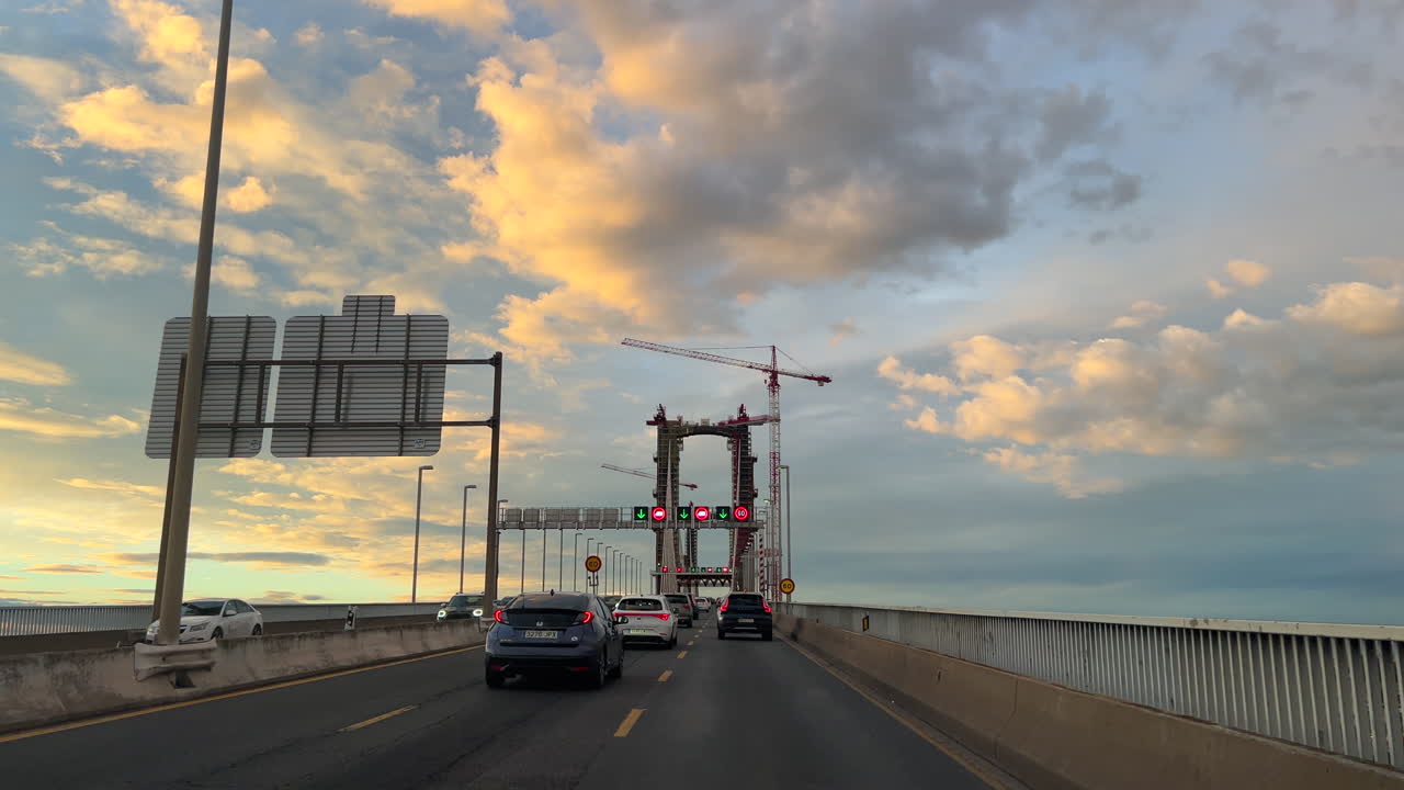 Sunset Traffic on a Bridge Under Construction