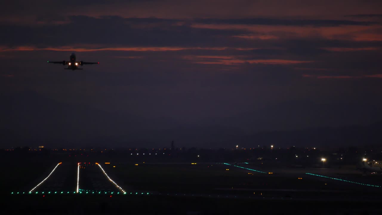 Aircraft taking off to a nice orange sunset sky