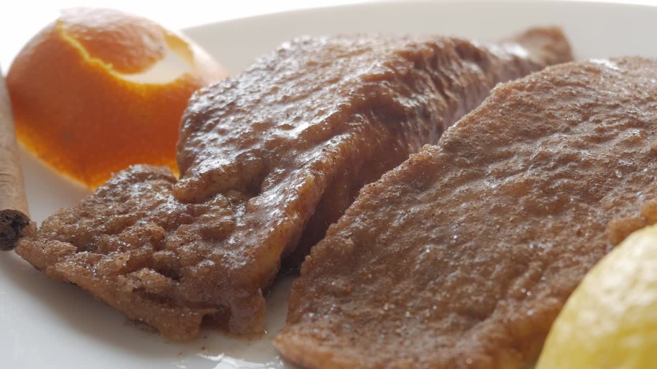 Torrijas dessert served with orange and cinnamon, traditionally made for Easter week